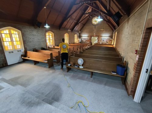 Professional deep carpet cleaning in a church